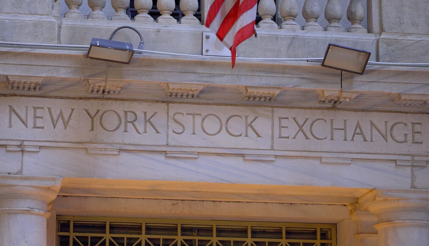 Stocks Settle Lower as Crude Oil Prices Jump